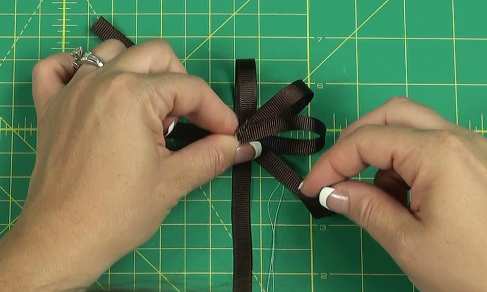 Woman making a Flower Bow
