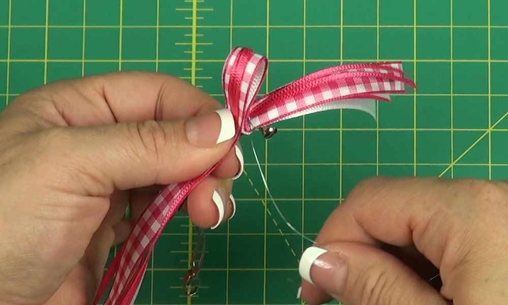 Woman making a Loopy Bow